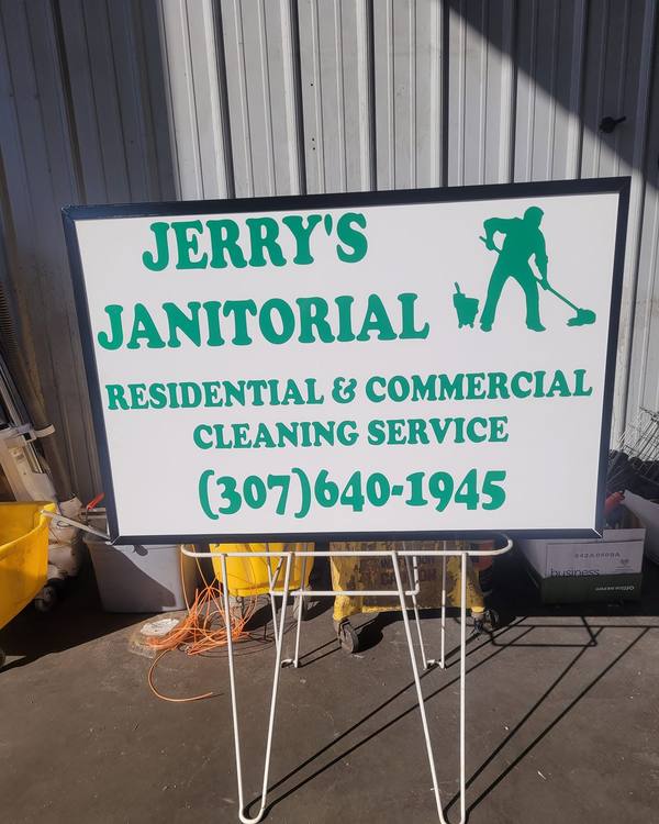 The green and white Jerry's Janitorial yard sign