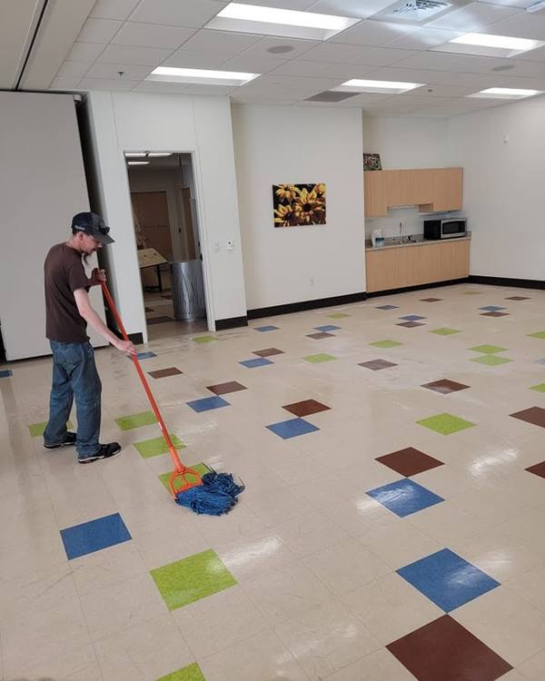 Mopping a floor of colored tile