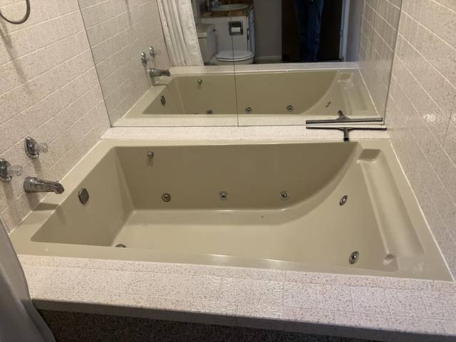 A jetted tub, wiped down and dry