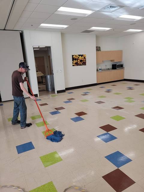 Mopping a floor of colored tile